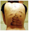 Тату-мастер сделал неверной девушке прощальный подарок в виде татуировки «в стиле фэнтези» на всю спину