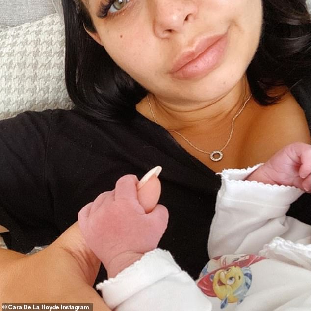 Sweet: Just hours earlier, Cara shared the first snap of her newborn daughter as they returned home from the hospital