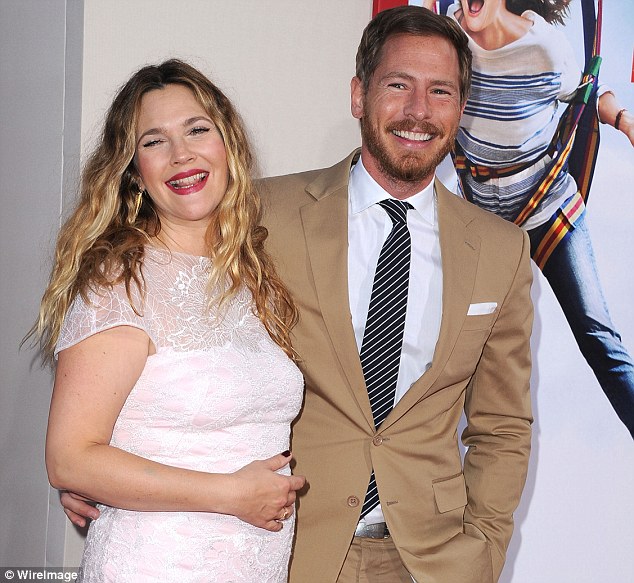 Split: Drew Barrymore and Will Kopelman have confirmed their divorce with a joint statement; the pair are seen in 2014