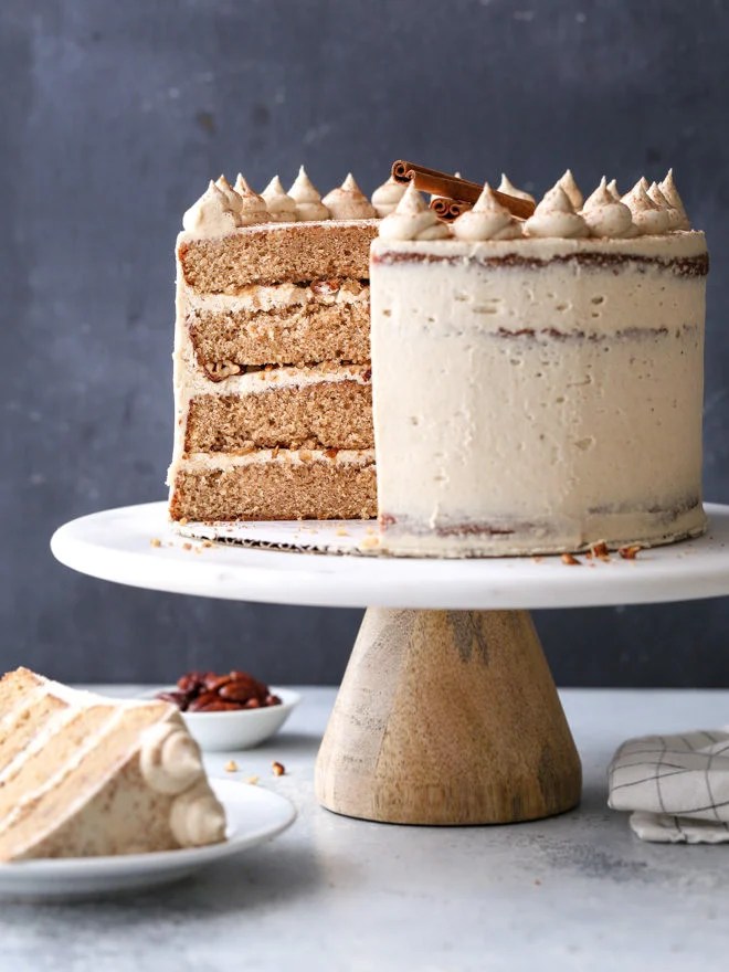 This brown sugar cinnamon layer cake is full of autumn flavor and spice, with moist cake layers and the fluffiest buttercream frosting!