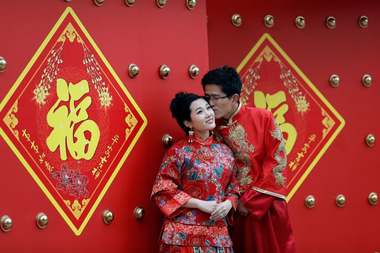 В оформлении китайской свадьбы ключевую роль играет красный цвет