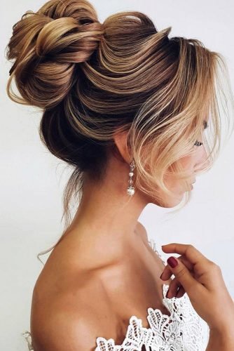 wedding hairstyles for long hair elegant textured high bun on blonde hair ksenya_makeup